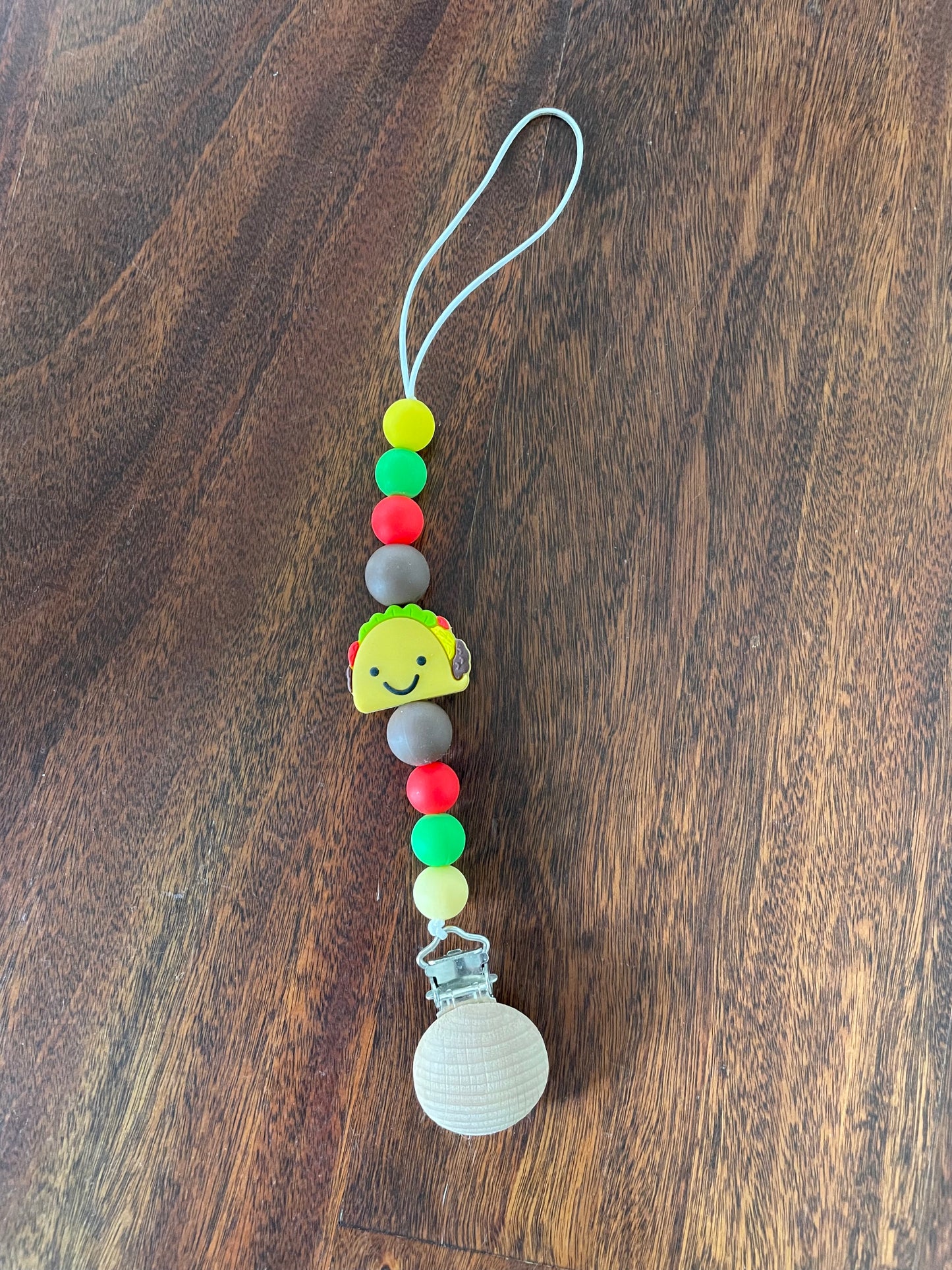 Taco binky clip