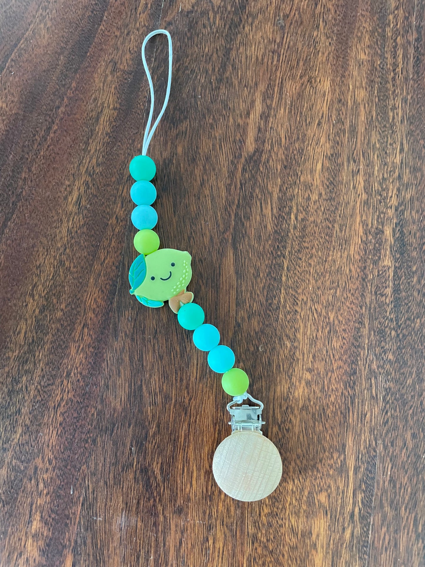 Lime binky clip