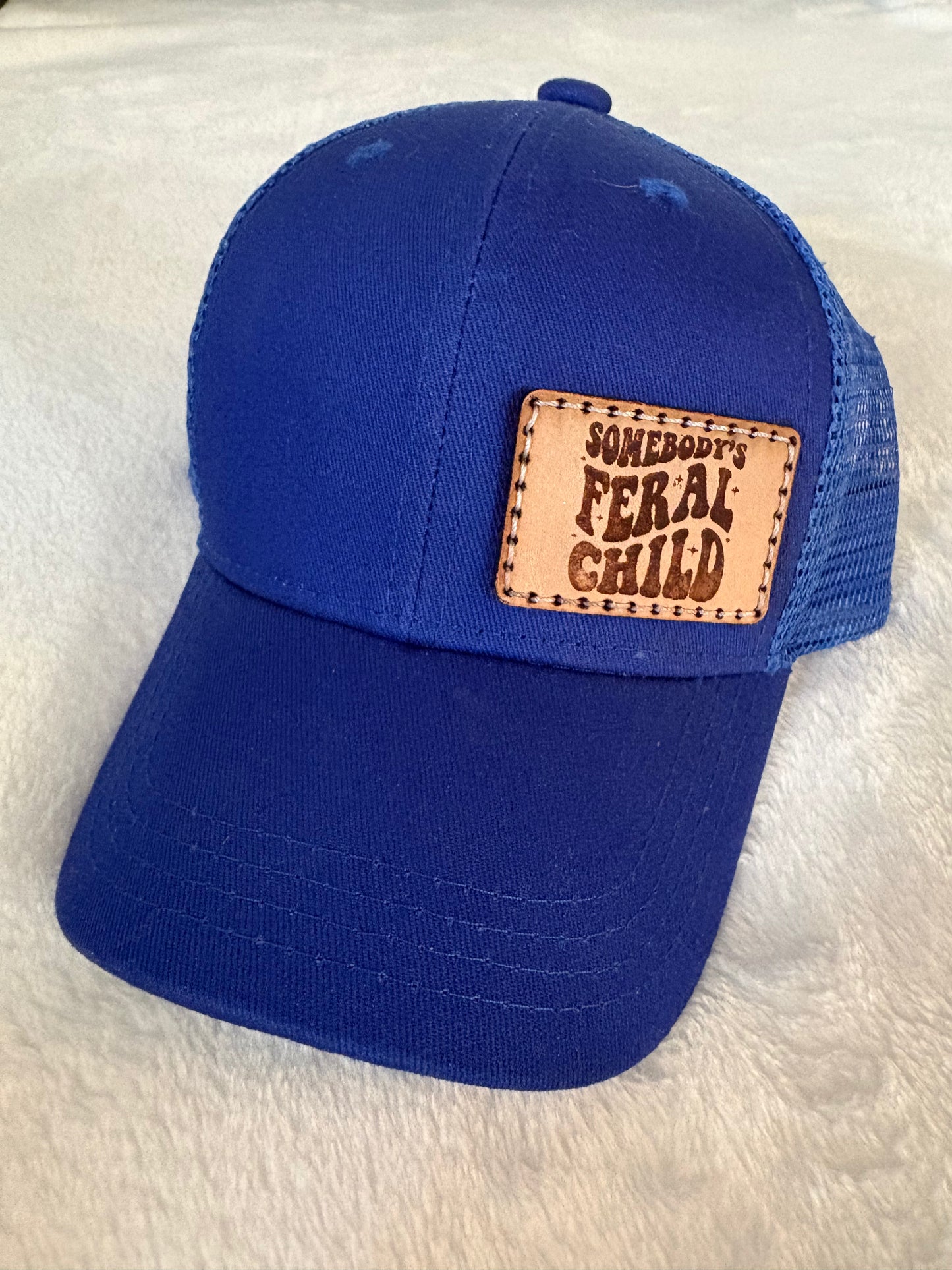 Feral child snap back hat