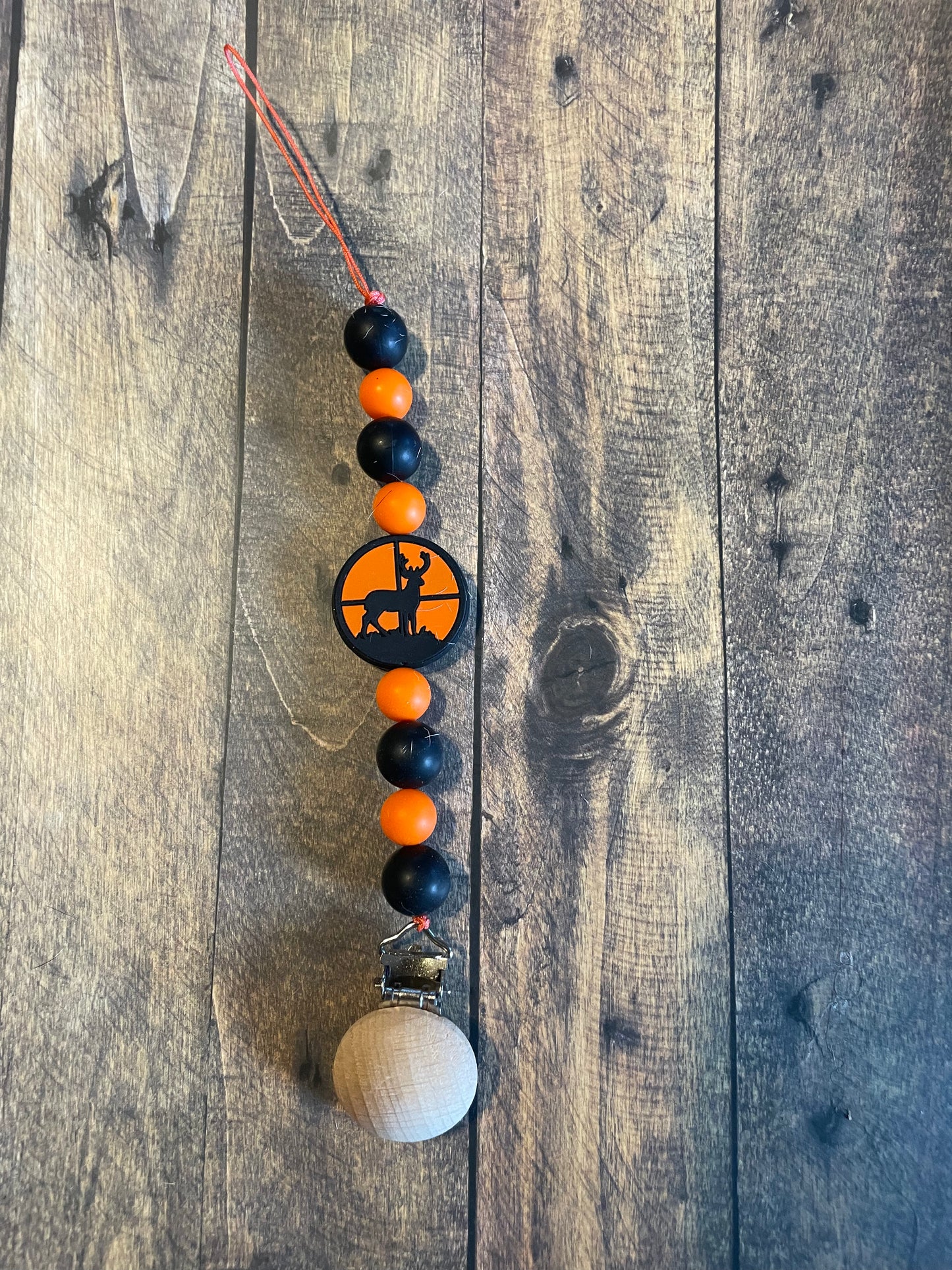 Deer hunting binky clip