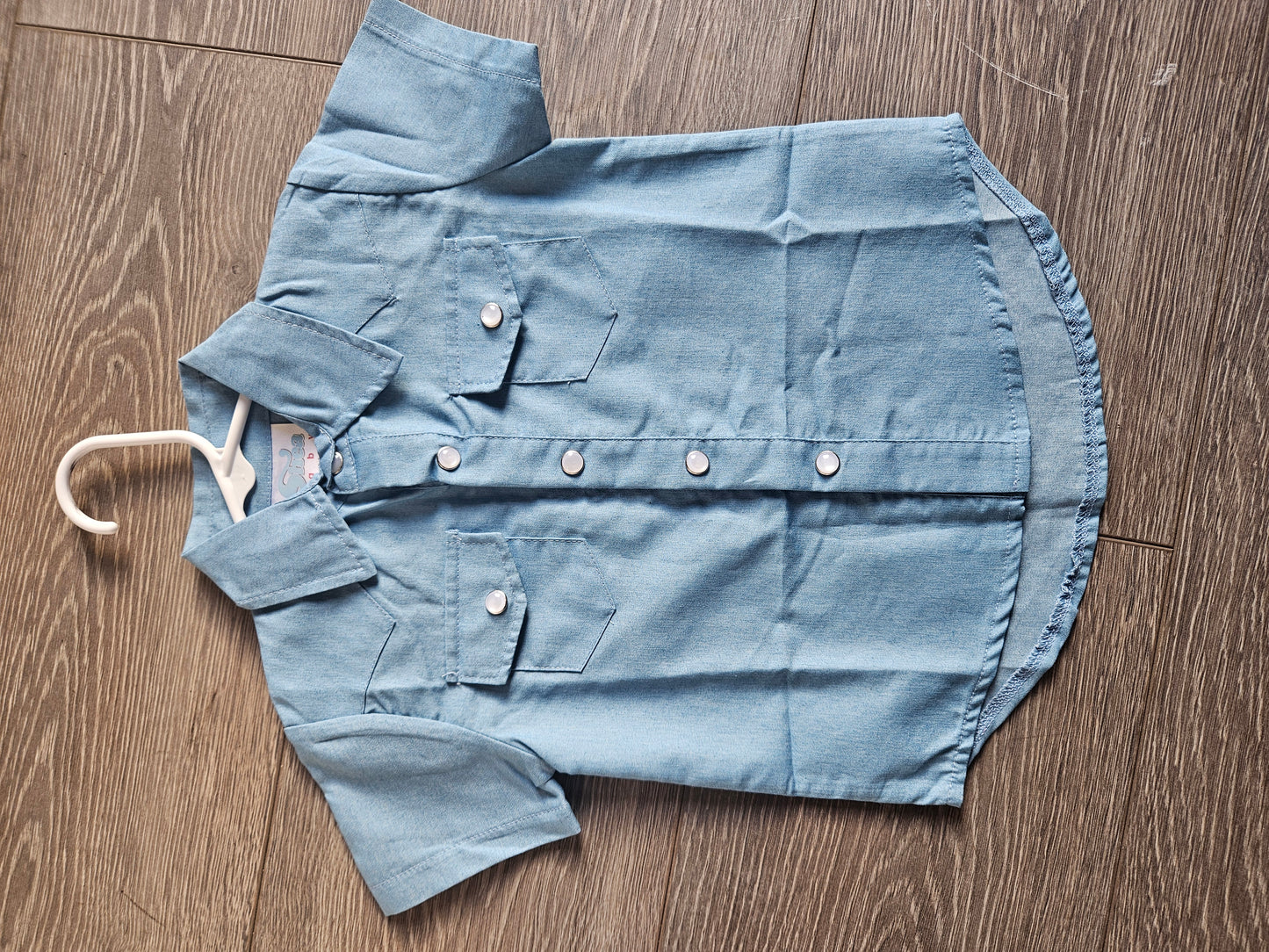 Blue button up shirt or onsie
