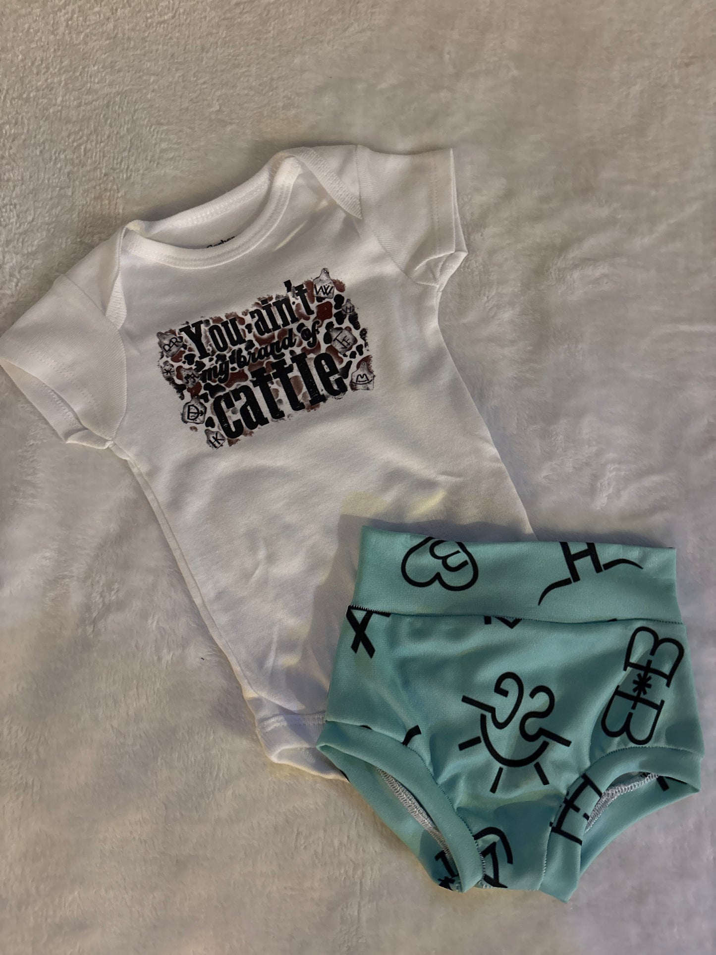 Brand of cattle bummie set
