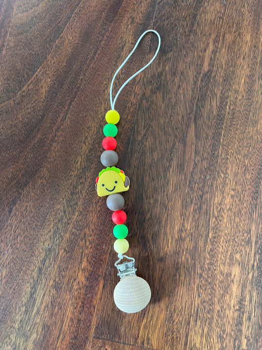 Taco binky clip