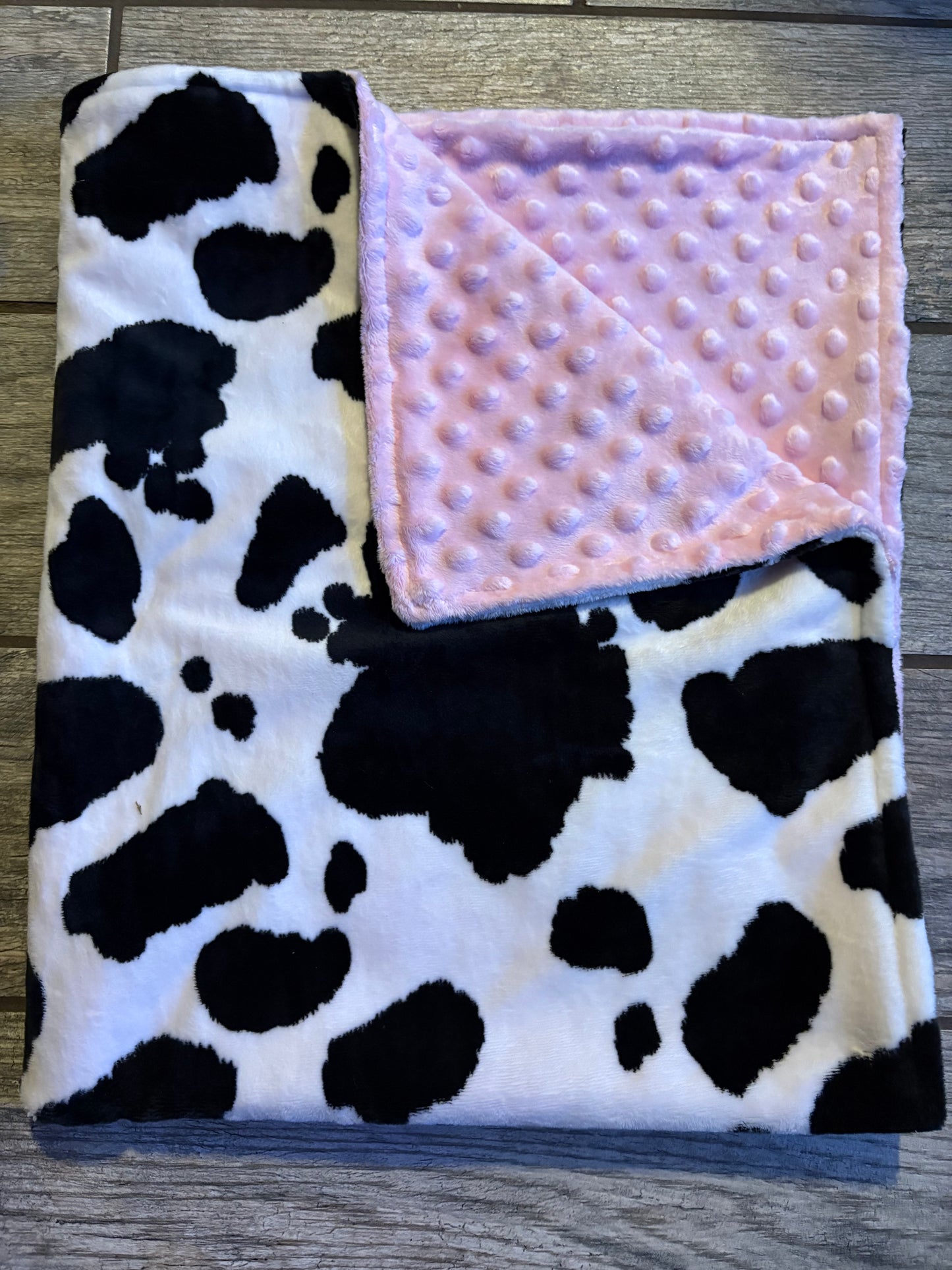 Cow print with pink minky blanket