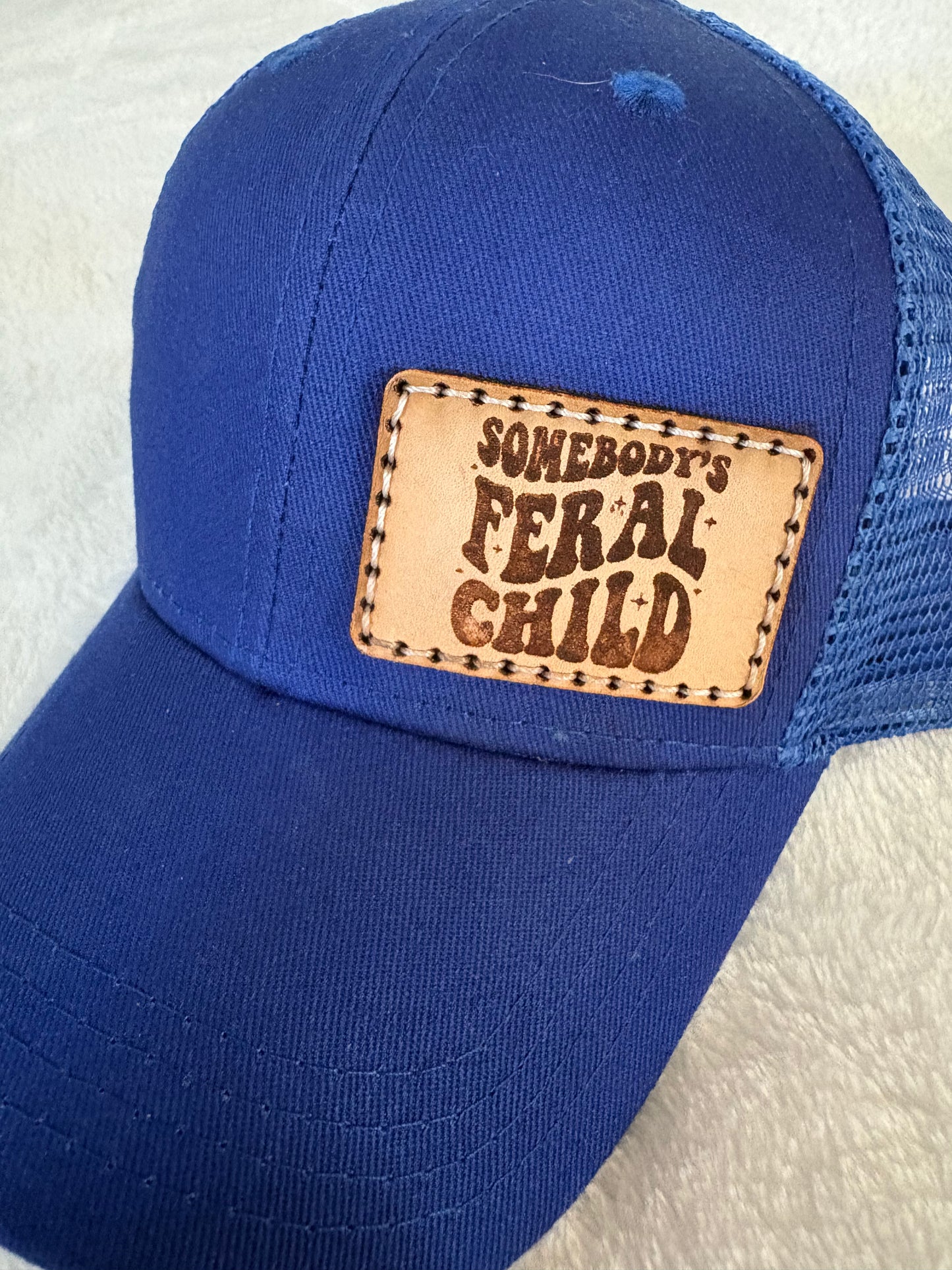 Feral child snap back hat