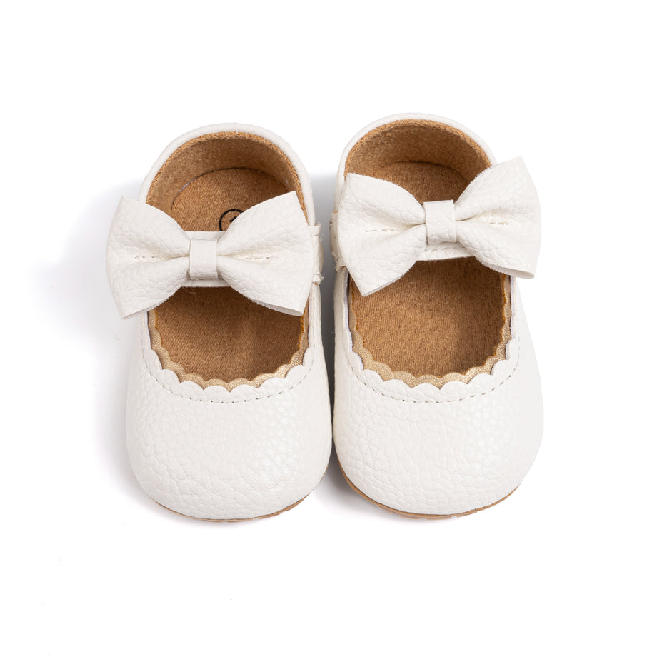 White bow shoes